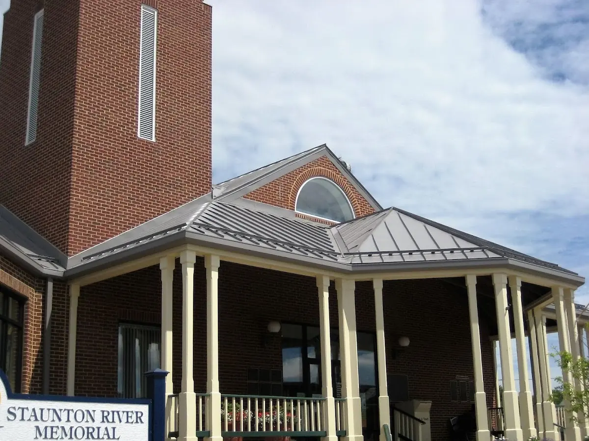 Skilled roofing craftsmen working on a residential roof in Middletown